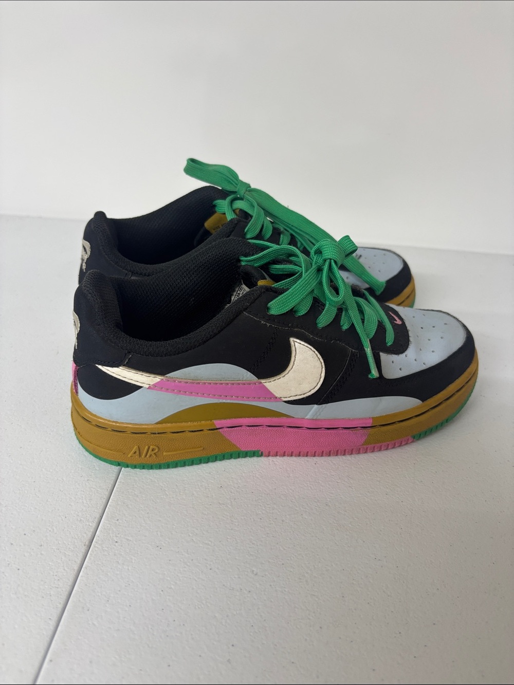 Nike Low-Top Sneakers — Black, Pink, Green & Gold Accents